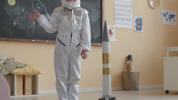 Tilt Portrait Little Asian Boy Wearing Astronaut Costume Standing Handmade — Stock Video