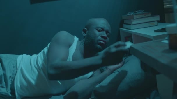 Sleepless Black Man Lying Bed Night Trying Fall Asleep Checking — Stock Video
