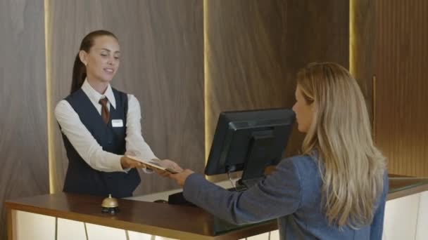 Female Receptionist Giving Digital Tablet Woman Putting Her Signature Touch — Stock Video