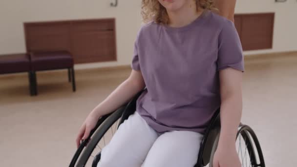 Tilt Portrait Shot Young Woman Wheelchair Male Volunteer Dance Studio — Stock Video