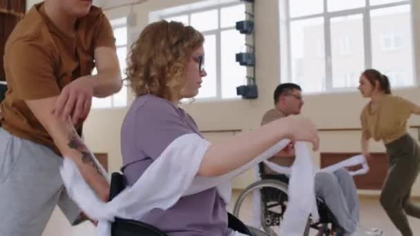 Young Girl Wheelchair Male Choreographer Practicing Dance Performance White Ribbon — Stock Video