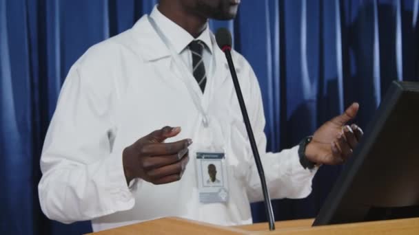 Tilt Shot African American Medical Expert White Coat Standing Lectern — Vídeo de stock