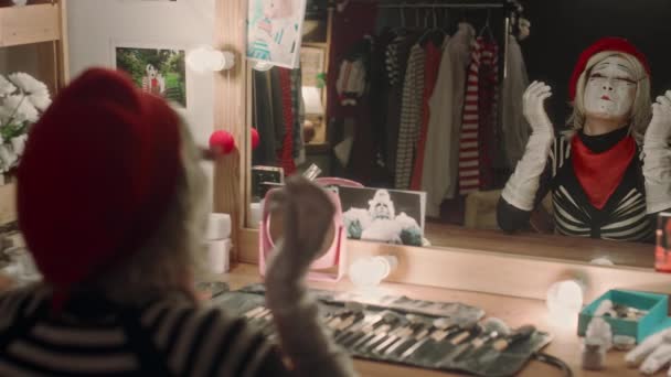 Female Mime Artist Sitting Vanity Desk Dressing Room Portraying Sad — Stock Video