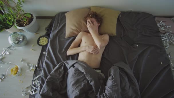 View Young Shirtless Guy Waking Bed Feeling Bad Hangover Cluttered — Stock Video