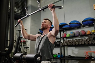 Professional Caucasian athlete using weight machine to bulk muscle clipart