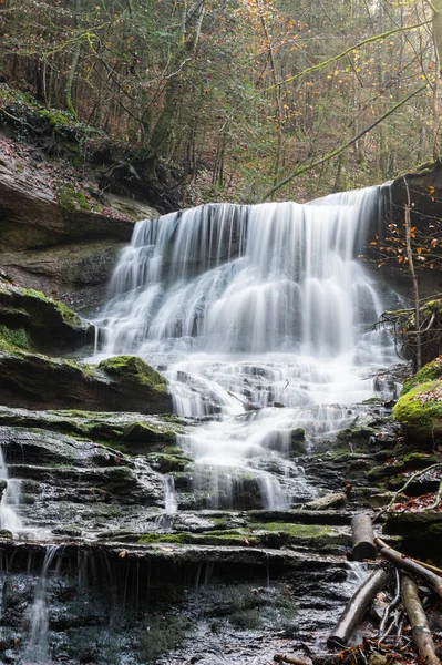 stock image long  exposure of a waterfall in a valley in southern germany