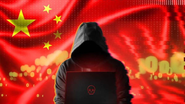 Cyber threat from the China. A Chinese hacker at a computer against the background of the colors of the China flag. DDoS attack.