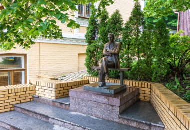 Monument to Mykhail Bulgakov in Andrew's Descent in Kyiv clipart
