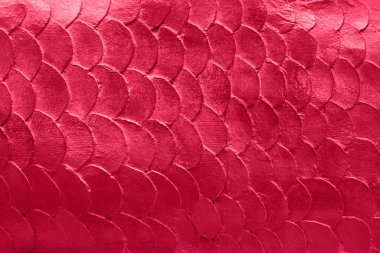 Deniz kızı ya da balık pullarının yakın çekim deseni 2023 Viva Magenta 'nın moda rengine uygun.