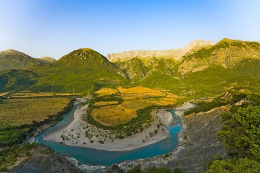 Vjosa river bend panorama at sunrise. I got up at 3 am in the morning to get there for the photo as the area is very remote from Gjirokastra. clipart