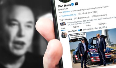 Ukrayna. Poltava. 21 Ekim 2024. Elon Musk profili akıllı telefon ekranında. Mesajlı yeni tweet. Arka planda Elon Musk 'un odaksız bir portresi var..