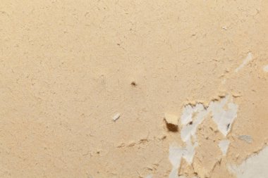 Klasik sarı arkaplan dokusu duvarı, yırtık duvar kağıdı.