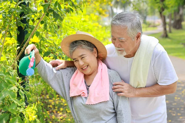 Asian Senior Couple Incasual Embracing Spending Time Garden Backyard While — Stock Photo, Image