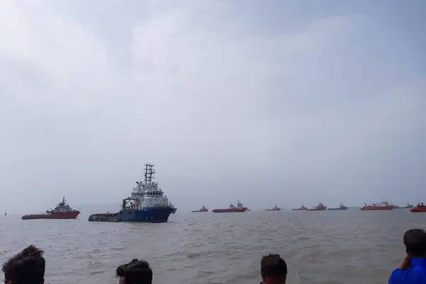 stock image Mumbai, Maharashtra, India - August 11, 2019; magnificent view of some water vessels or ships in the Arabian Sea at Mumbai Port, the port is primarily used for bulk cargo, while most container traffic is directed to Nhava Sheva Port across the harbor