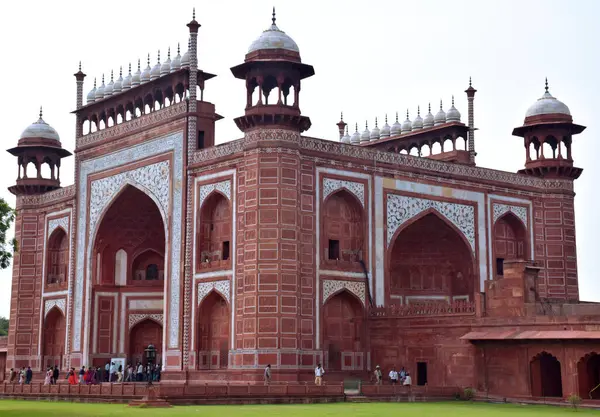 stock image 10-08-2023, Agra, Uttar pradesh, India Great gate (darwaja-i rauza) taj mahal entrance gate, The exterior of this gate is made of red sandstone