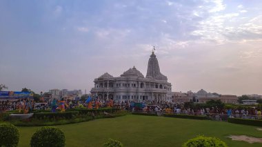 14-08-2023, Vrindavan, U.P., India. Amazing view of Prem Mandir in the evening, this temple is an example of renaissance of ancient Indian sculpture. clipart