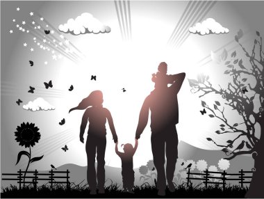 Güzel bir doğanın arka planında mutlu aile siluetleri..