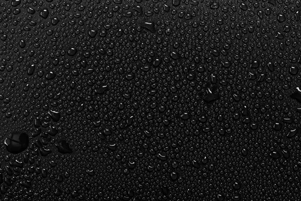 Siyah Arkaplanda Damlacıkları — Stok fotoğraf