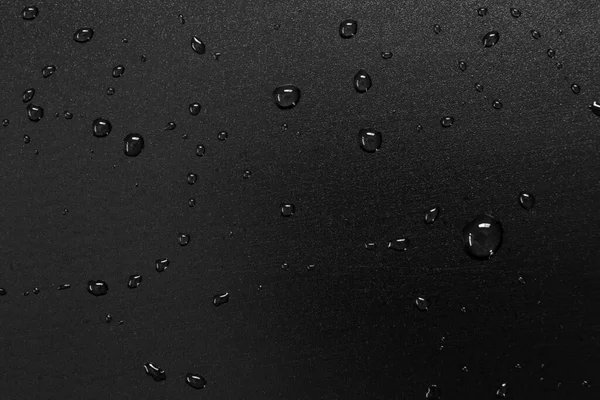 Wassertropfen Auf Schwarzem Hintergrund — Stockfoto