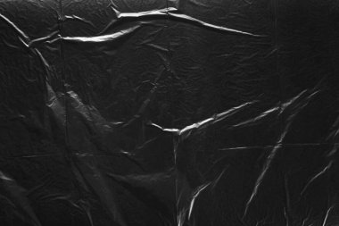 Siyah plastik torbaların arkaplanı.