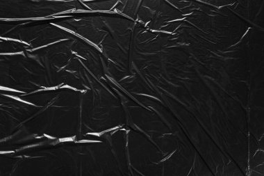 Siyah plastik torbaların arkaplanı.