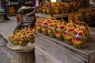 2 May 2024 Chiang Khan Walking Street, a tourist attraction in Loei Province, Thailand, next to the Mekong River separating Thailand and Laos. clipart