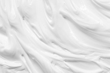 Cilt kremi dokusu. Beyaz kozmetik losyon arka planı. Kremalı jel, nemlendirici, makyaj ürünü kumaş örneği makro