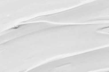 Cilt kremi dokusu. Beyaz kozmetik losyon arka planı. Kremalı jel, nemlendirici, makyaj ürünü kumaş örneği makro