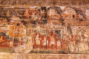 11 Ocak 2025 Ahşap zeminde eski resim deseni, Wat Phra Lampang Luang, Tayland.