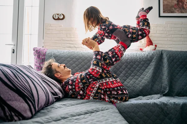 Image Depicts Father Daughter Matching Pajamas Father Lifting Daughter His — Stock Photo, Image