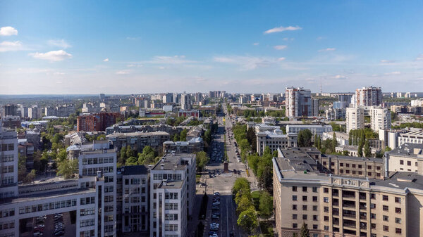 Aerial view on Nauky Ave, street near Derzhprom with cars driving in spring Kharkiv, Ukraine