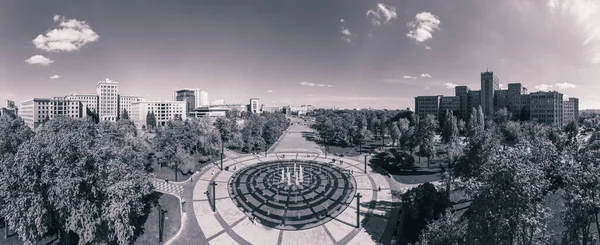 stock image Aerial view on Karazin National University buildings on Freedom Square with circle fountain in Kharkiv, Ukraine. Grayscale