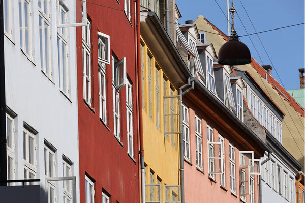 The pastel colors of the characteristic buildings of Copenhagen. High quality photo