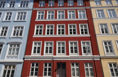 The characteristic pastel colors of the buildings in the city of Copenhagen. High quality photo