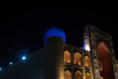Night view of the Mir-i Arab Madrasa in Bukhara, Uzbekistan. High quality photo clipart