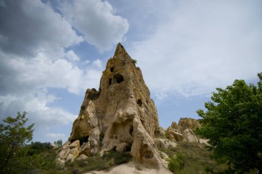 Rock-hewn dwellings at the Goreme Open Air Museum in Cappadocia, Turkey. High quality photo clipart