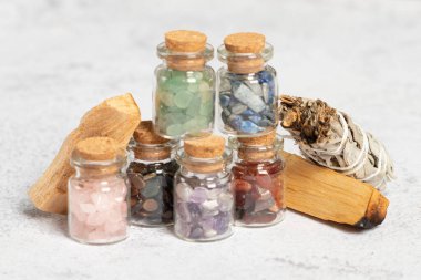 Crystals gemstones Set on white wooden table. minerals for esoteric spiritual practice, Healing Crystal Ritual, Witchcraft, Relax Chakra. Feng Shui, reiki therapy concept. flat lay