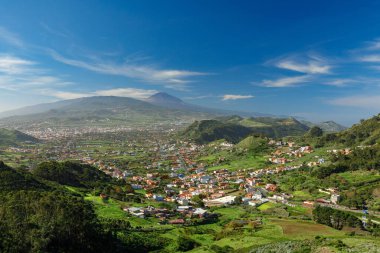 Vacation on Tenerife: View at San Cristobal de La Laguna and Teide volcano from Anaga National Park