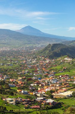 Vacation on Tenerife: View at San Cristobal de La Laguna and Teide volcano from Anaga National Park