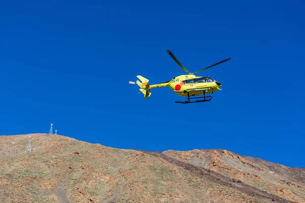 stock image Medical Rescue helicopter in the sky over the Teide volcano, Ter