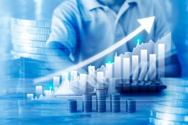 Finansal ve ticari yatırım konsepti için grafiğe ve sıra sıra paraya iki kez maruz kalma. Ekonomi yönü