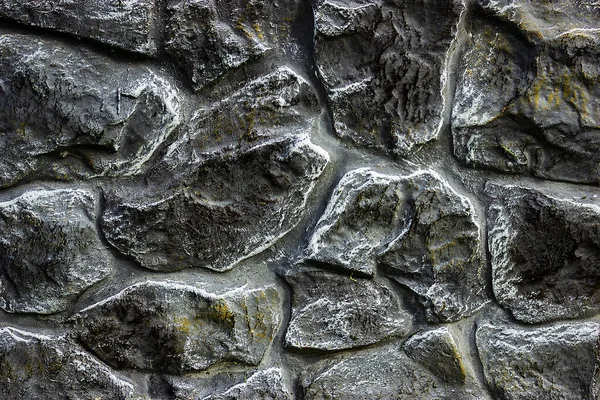 desenli siyah taş duvarı kapat