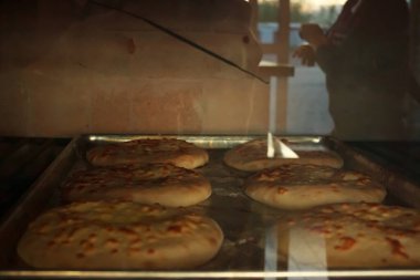 Traditional pastries are baked in the oven and covered with a crust