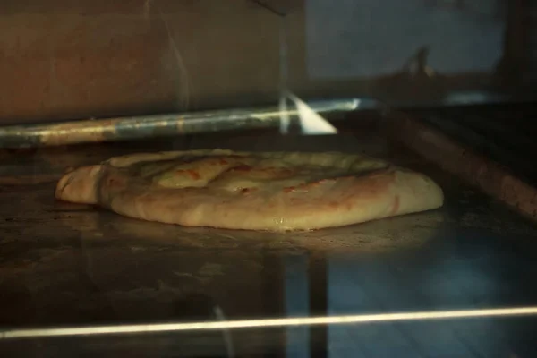 Traditional pastries are baked in the oven and covered with a crust