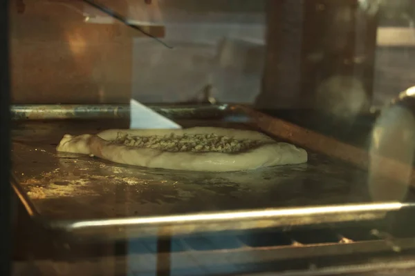 Traditional pastries are baked in the oven and covered with a crust