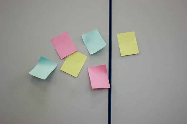 Multicolored sticky notes on the cabinet sticker