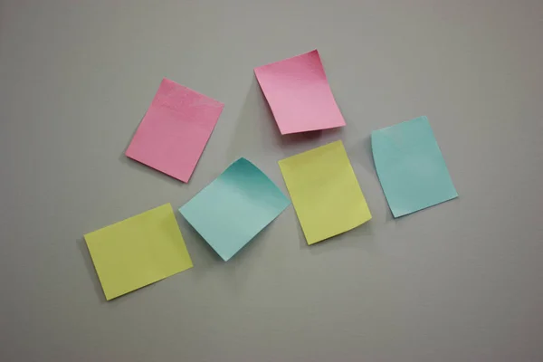 Multicolored sticky notes on the cabinet sticker