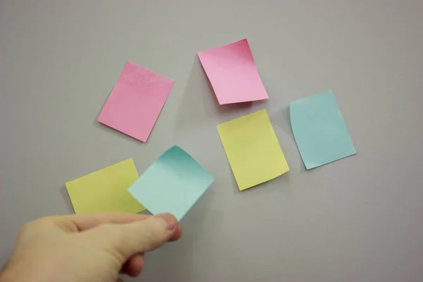 Colorful papers that are glued by hand on the locker