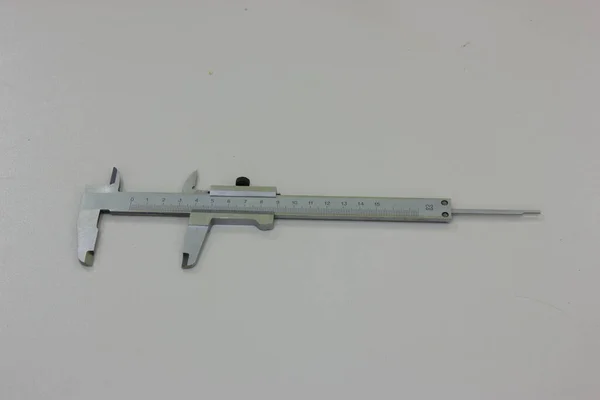 Caliper on a gray background