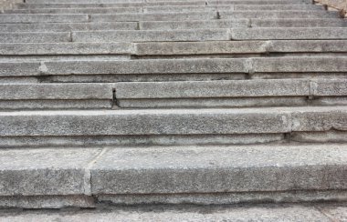 Concrete gray staircase in a horizontal plane frontal view